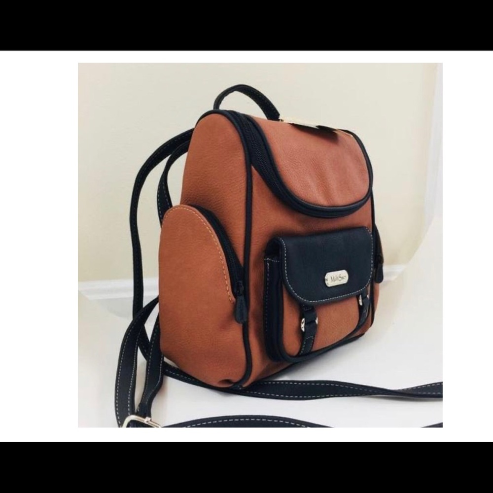 NWOT MultiSac Backpack,  several pockets Versatile